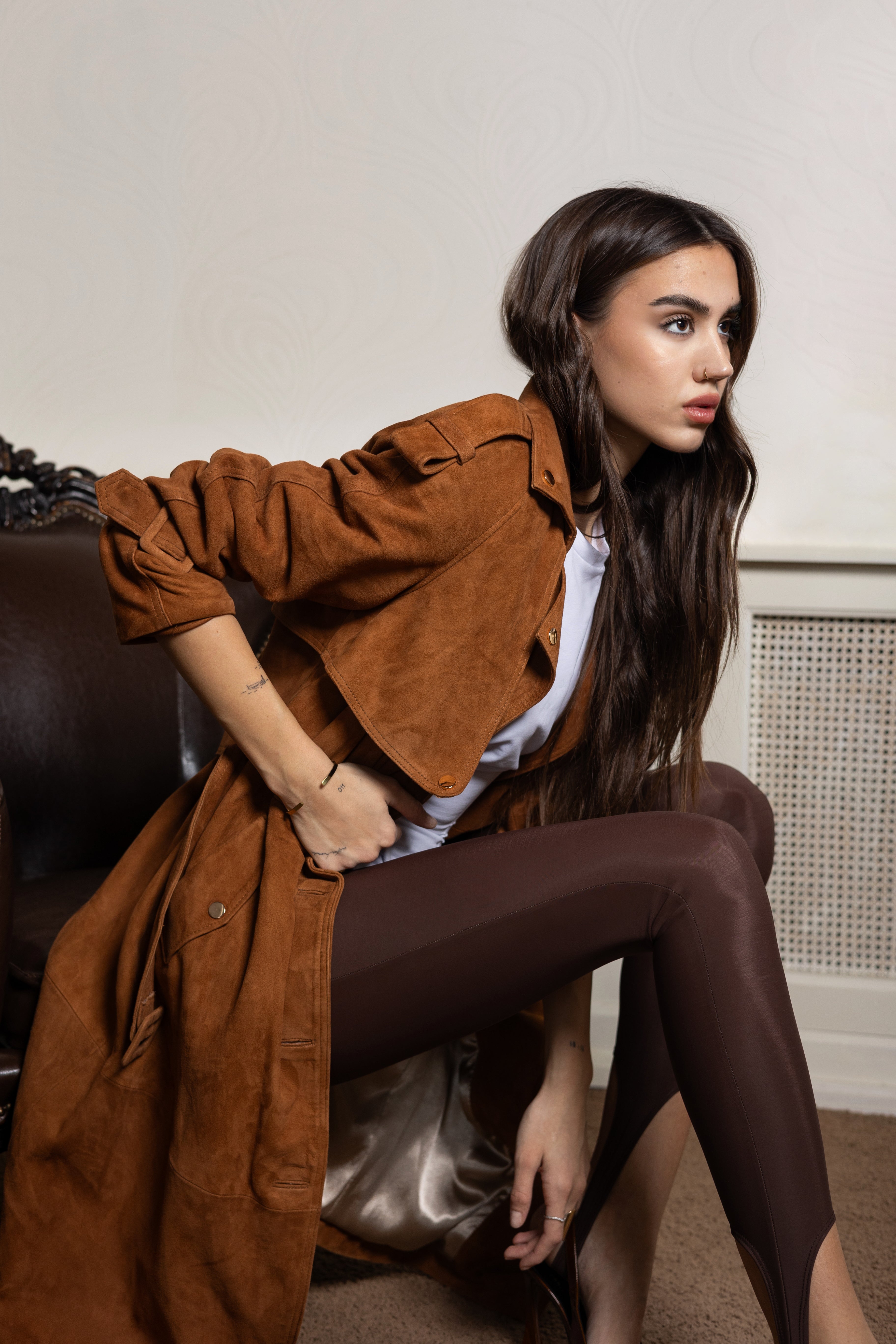Long women's suede coat with waist belt