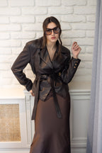 Fitted leather jacket with waist belt for women